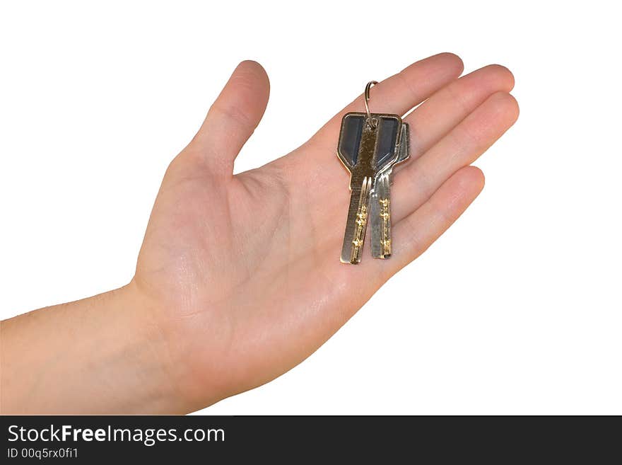 Keys in the hand on a white background. Keys in the hand on a white background.