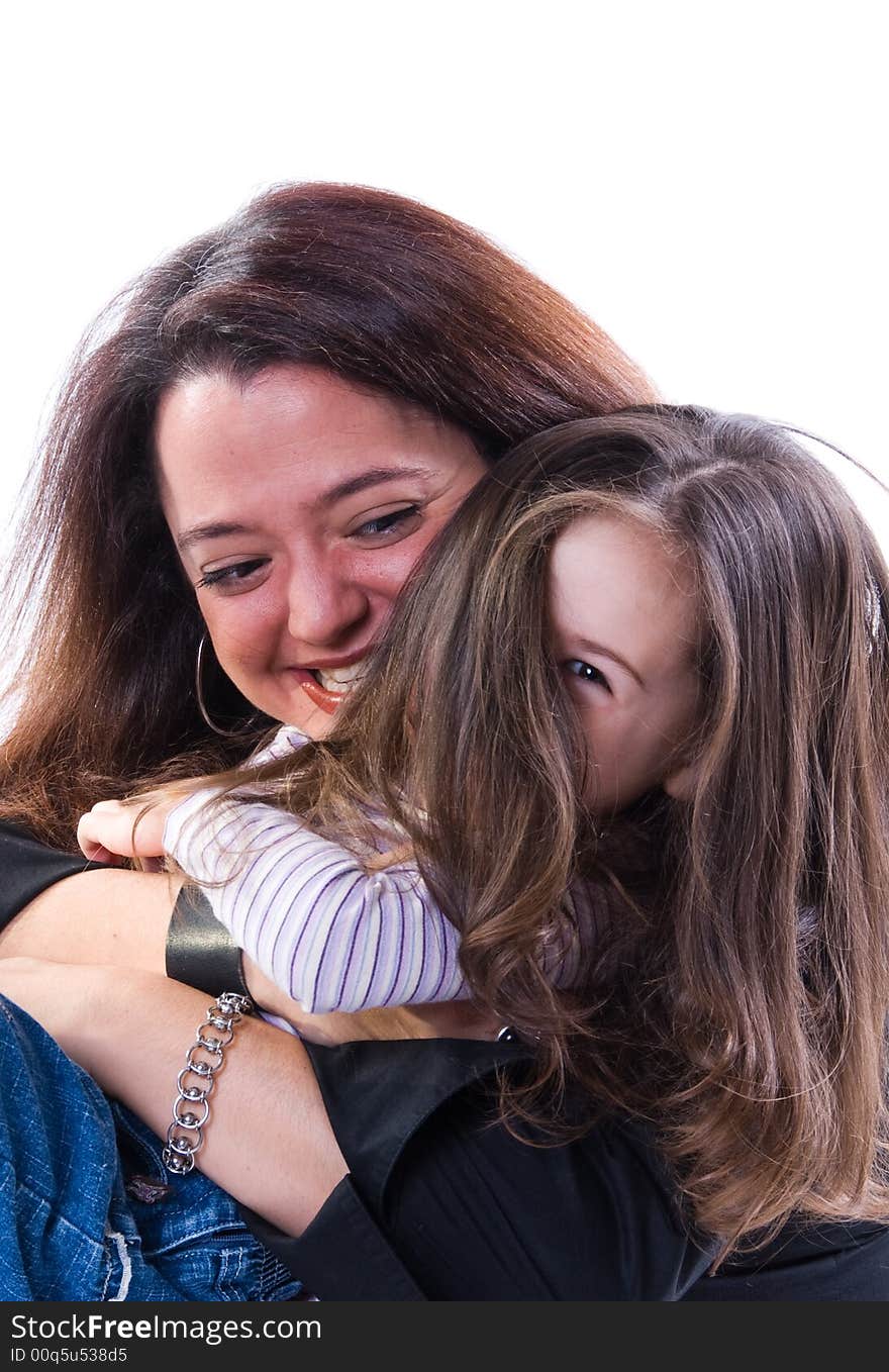 Mom and girl playing on white background. Mom and girl playing on white background