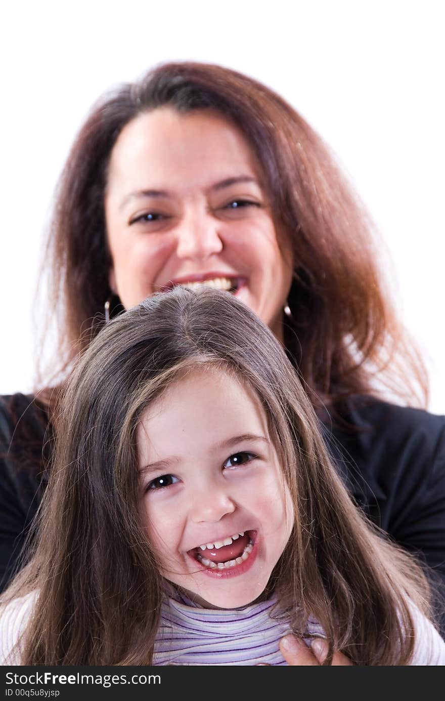 Mom and girl playing on white background. Mom and girl playing on white background