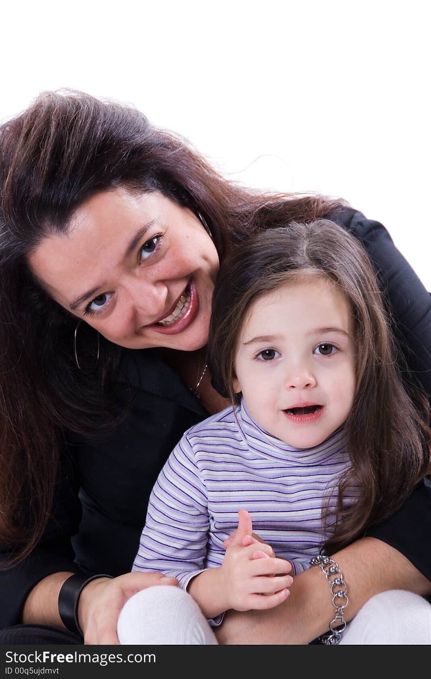 Mom and girl playing on white background. Mom and girl playing on white background