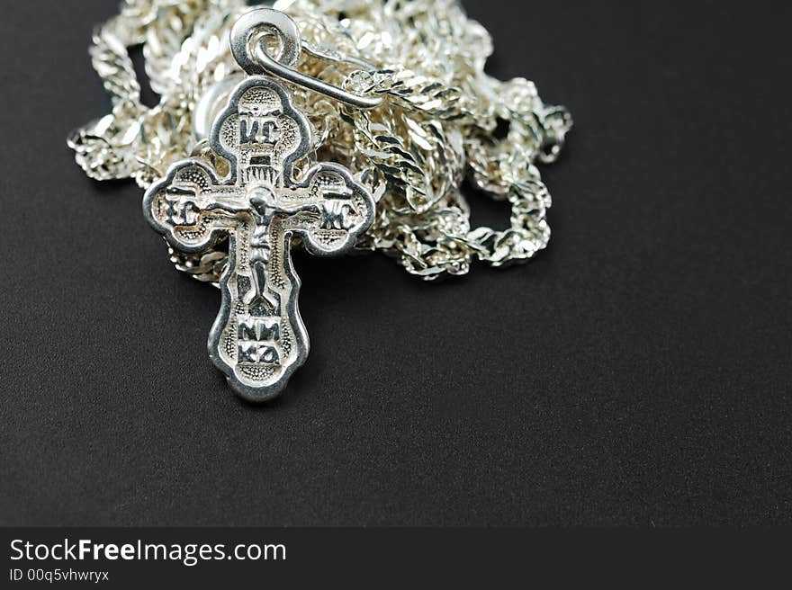 Silver chain with a dagger. The crucifixion. Silver chain with a dagger. The crucifixion