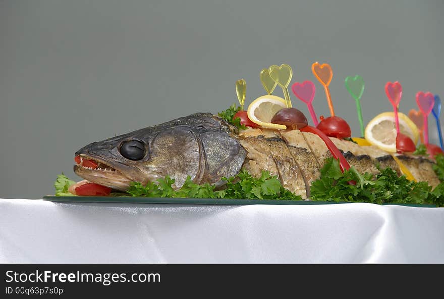 Stuffed pike fish with vegetables and fruits