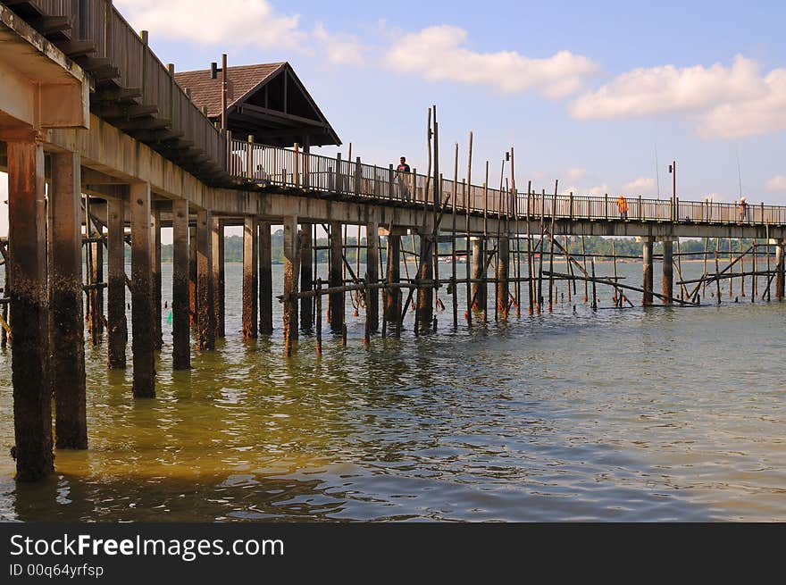 Shelter and wooden stilts