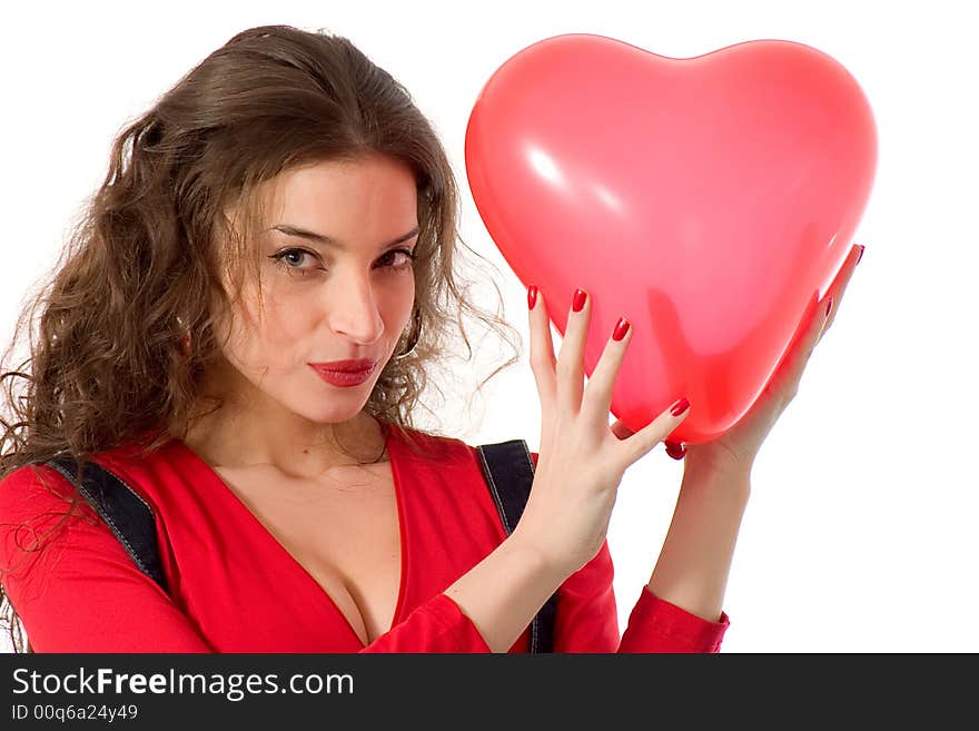 Attractive young woman holding heart shape balloon. Attractive young woman holding heart shape balloon
