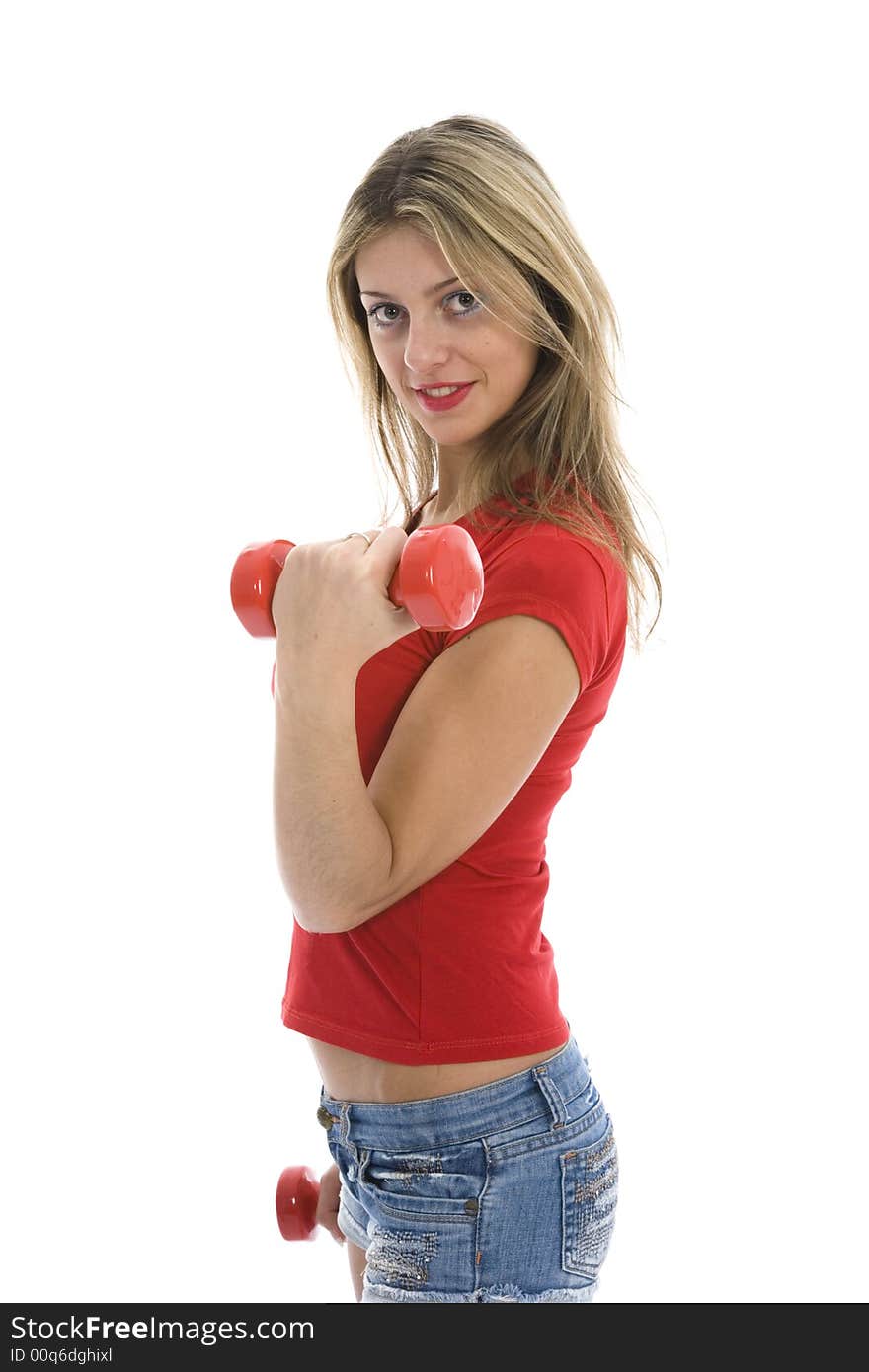 Beautiful girl with dumbbells