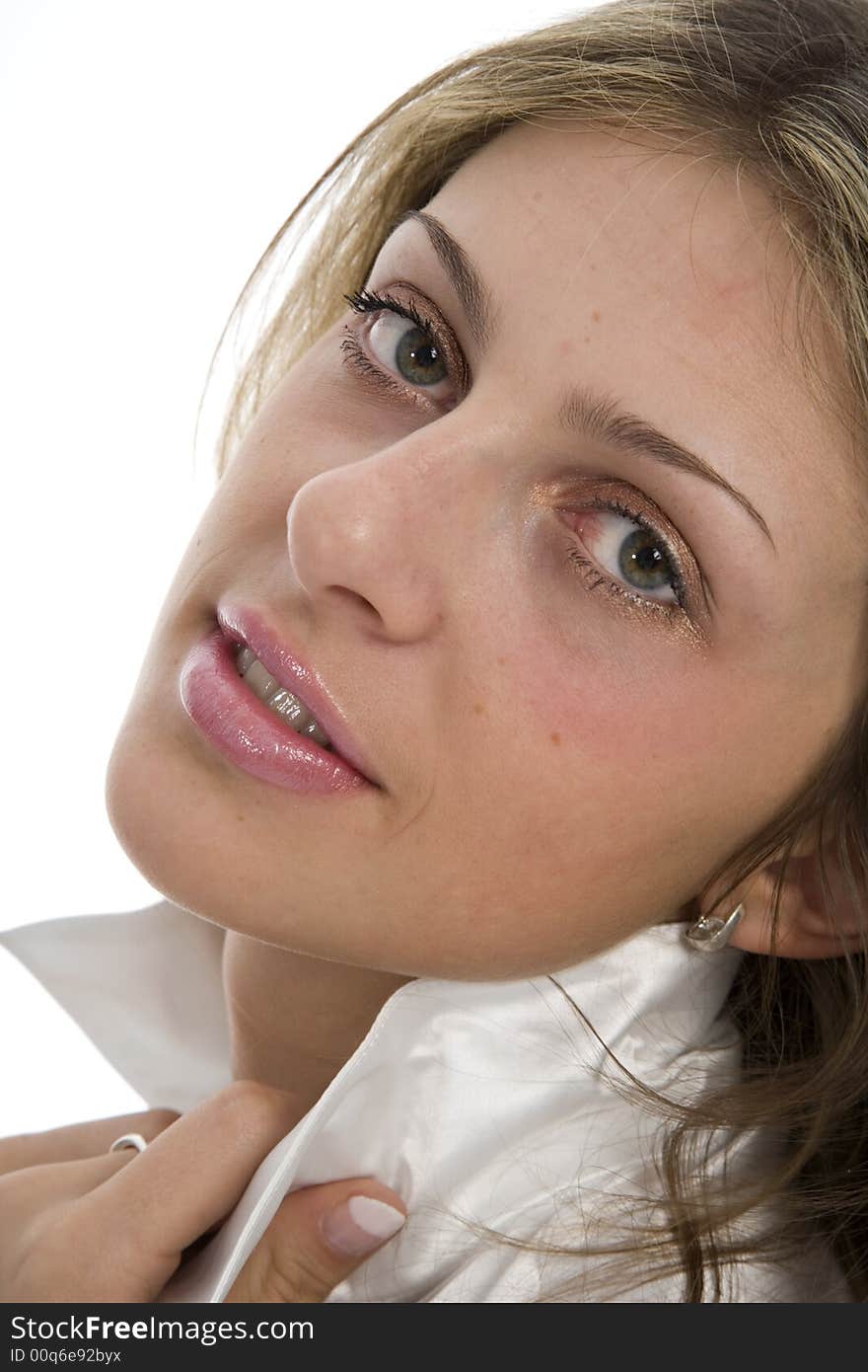 Portrait of the young beautiful girl on white background