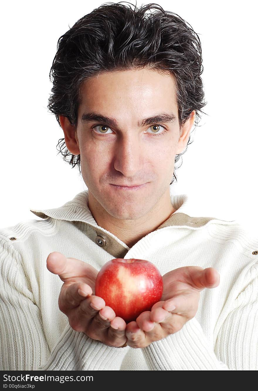 A man is holding fruit in his hands. A man is holding fruit in his hands