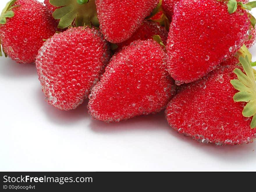 Artificial strawberries on white background. Artificial strawberries on white background