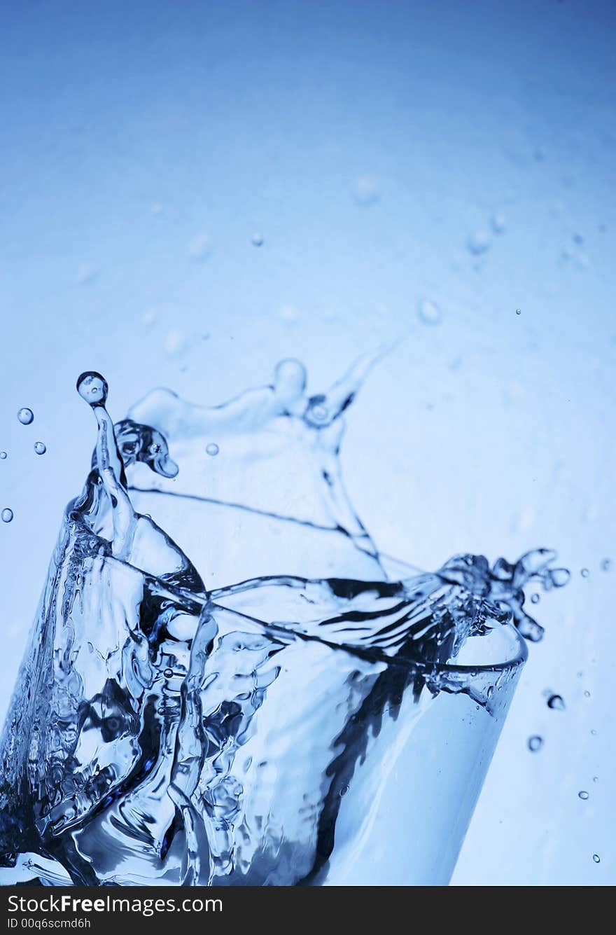 Ice splashing into a glass. Ice splashing into a glass.