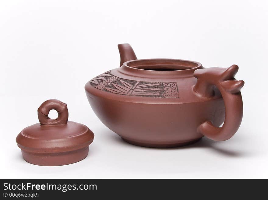 Brown clay teapot from China.