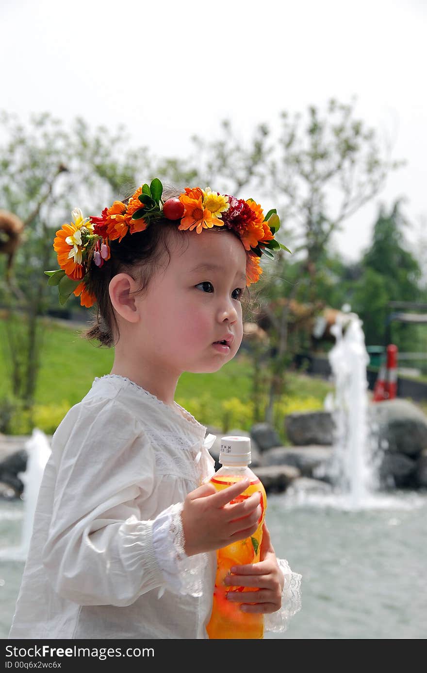 Lovely Child With A Coronet Of Flowers