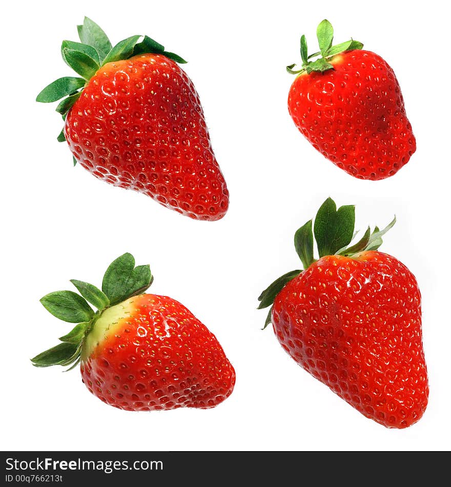 Four different strawberries isolated on white background. Four different strawberries isolated on white background