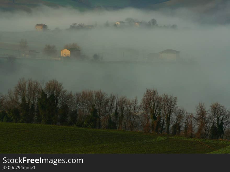 Mist in the valley in Marche, Italy. Mist in the valley in Marche, Italy