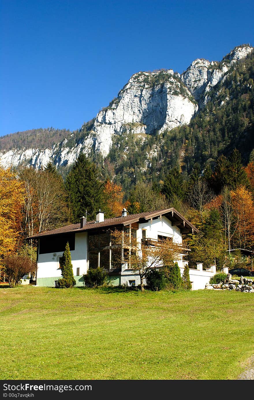 Nice small house near the Alps rock. Nice small house near the Alps rock