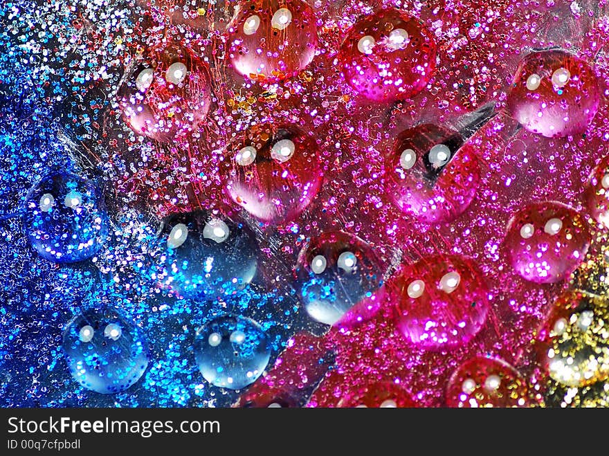 Macro shot of beautiful colored water drops