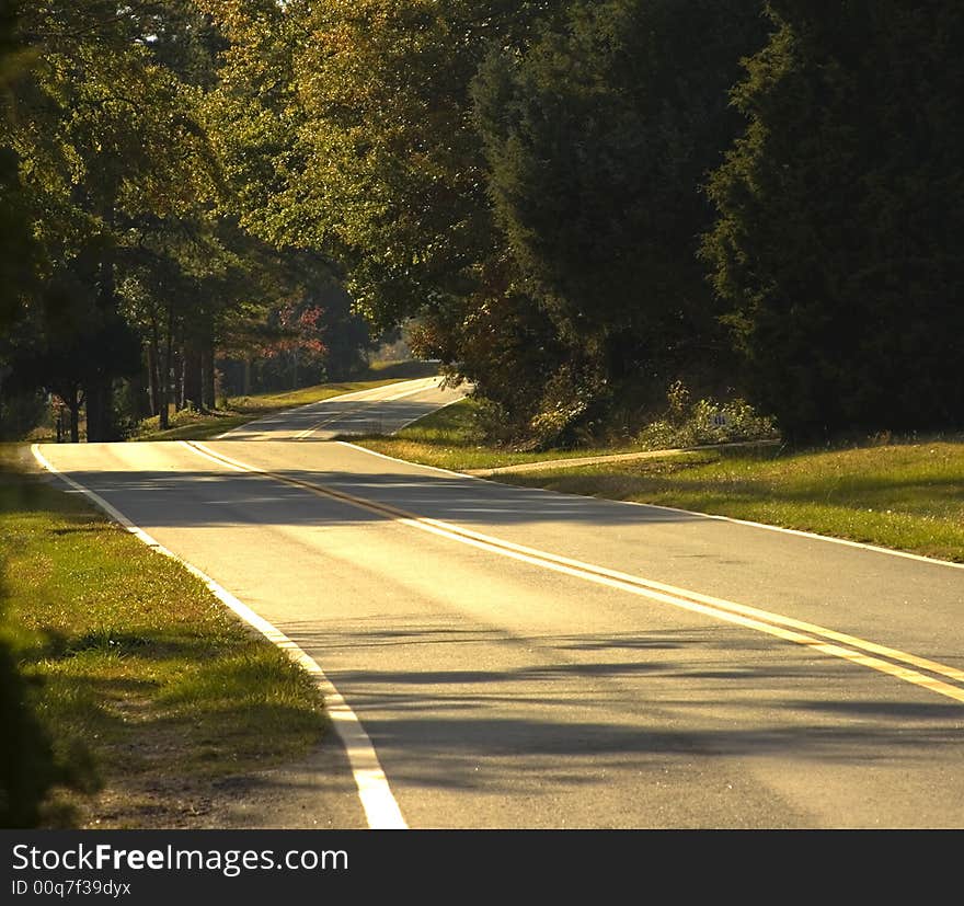 Rural country road in early Autumn. Rural country road in early Autumn