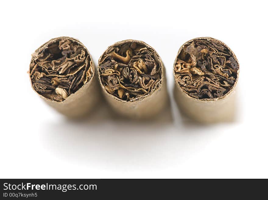 Front view of three cigars on white background. Front view of three cigars on white background