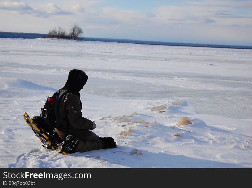 A frozen lake where the ice sheets were heaving like a breathing beast. A frozen lake where the ice sheets were heaving like a breathing beast.