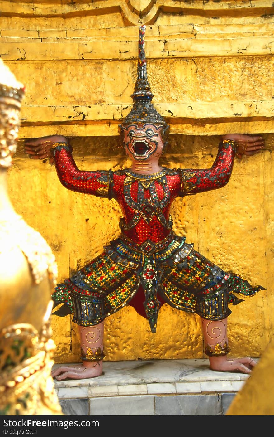 Buddhist temple keeper statue