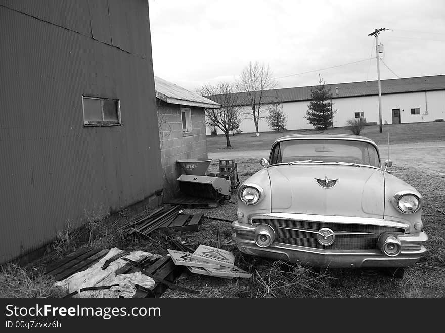 An old retro car from the 1950's sitting in the weeds in black and white.

1956 Buick Century. An old retro car from the 1950's sitting in the weeds in black and white.

1956 Buick Century