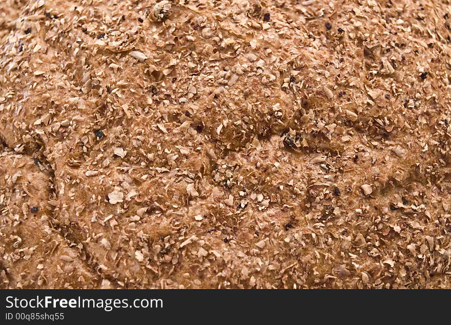 Loaf of fresh bread strewed by spices. Loaf of fresh bread strewed by spices