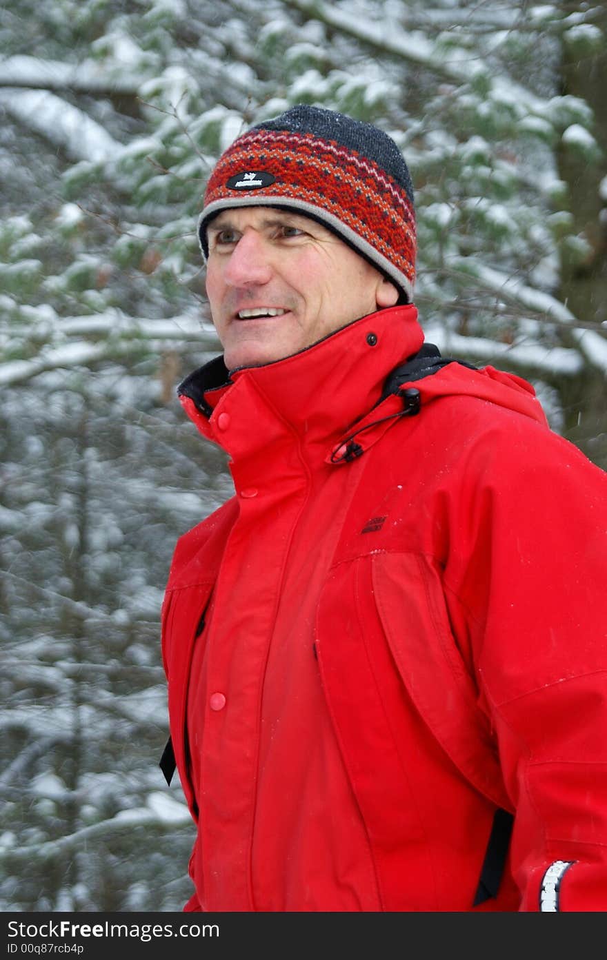 Outdoorsman enjoying the forest after a snowfall in Ontario. Outdoorsman enjoying the forest after a snowfall in Ontario