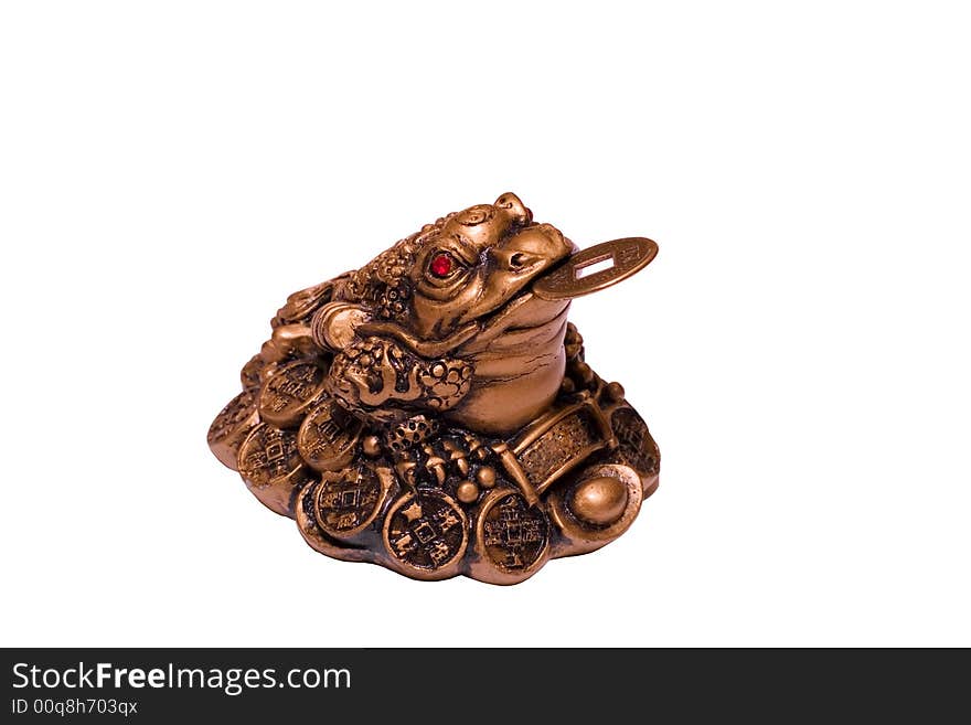 An old bronze statuette of frog with a coin in its