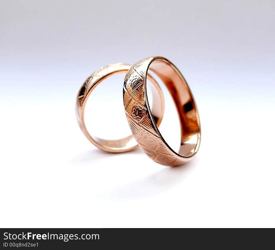 Wedding rings on white background