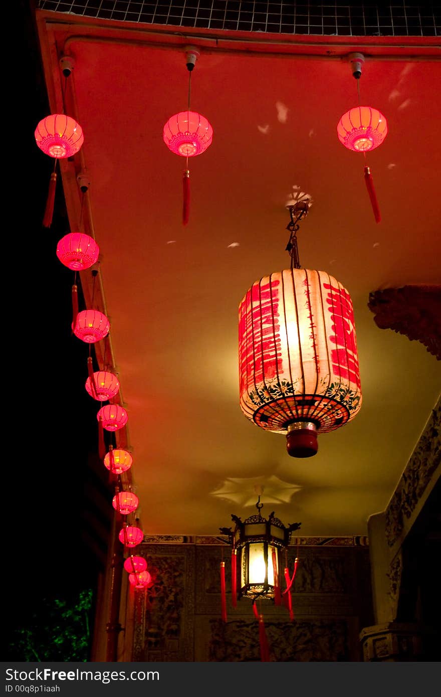 Chinese traditonal lanterns hanging out the front door. Chinese traditonal lanterns hanging out the front door