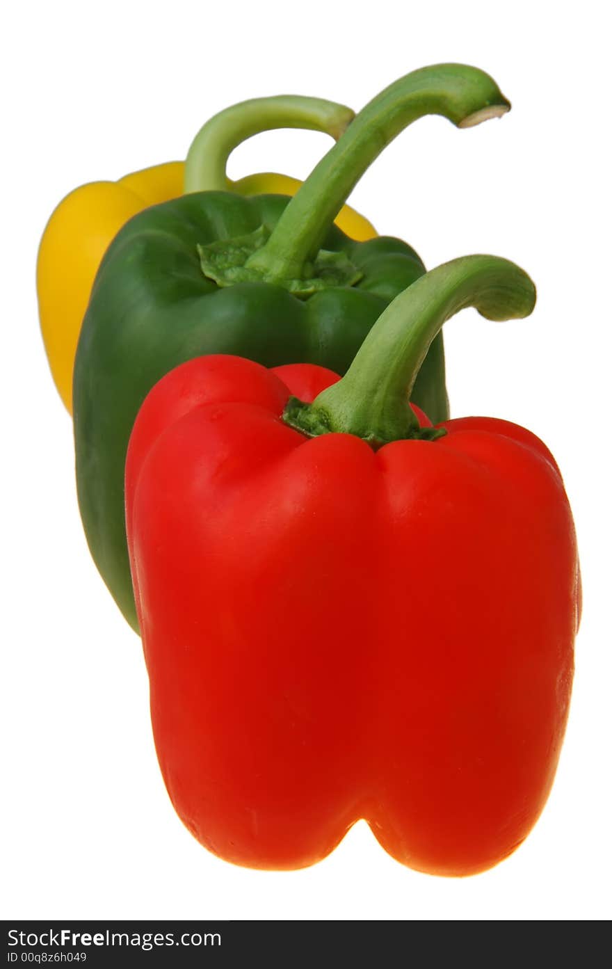 Fresh healthy red,green and yellow peppers closeup