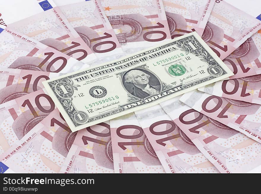 Euros bills and one dollar. Euros bills and one dollar