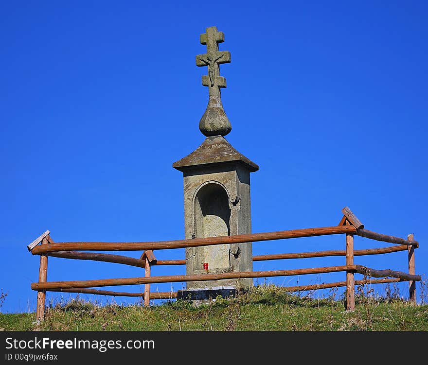 Old Eastern church shrine on blue sky background