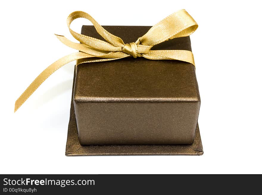 Brown gift box with gold ribbon