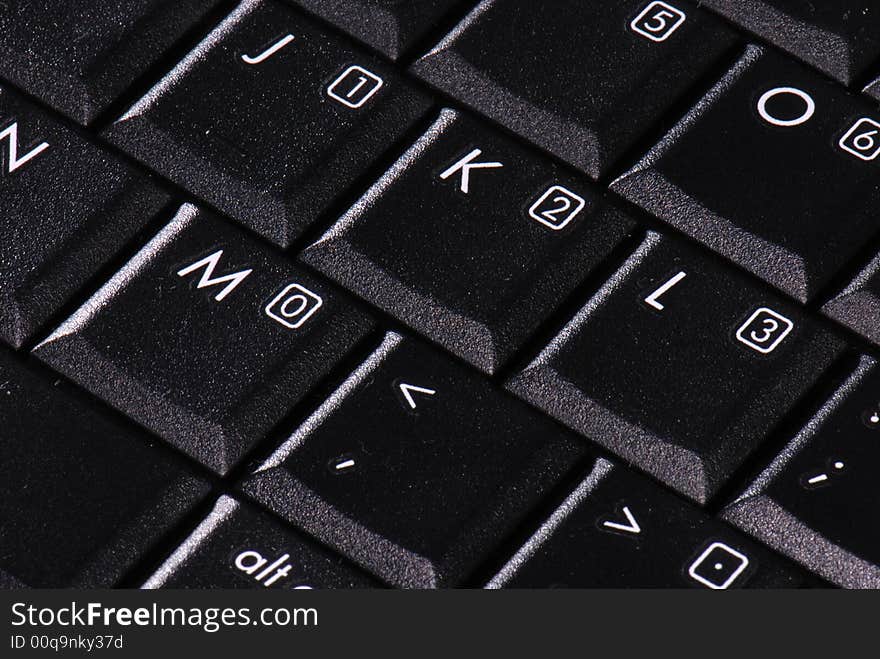 Keys on a computer keyboard in close-up. Keys on a computer keyboard in close-up