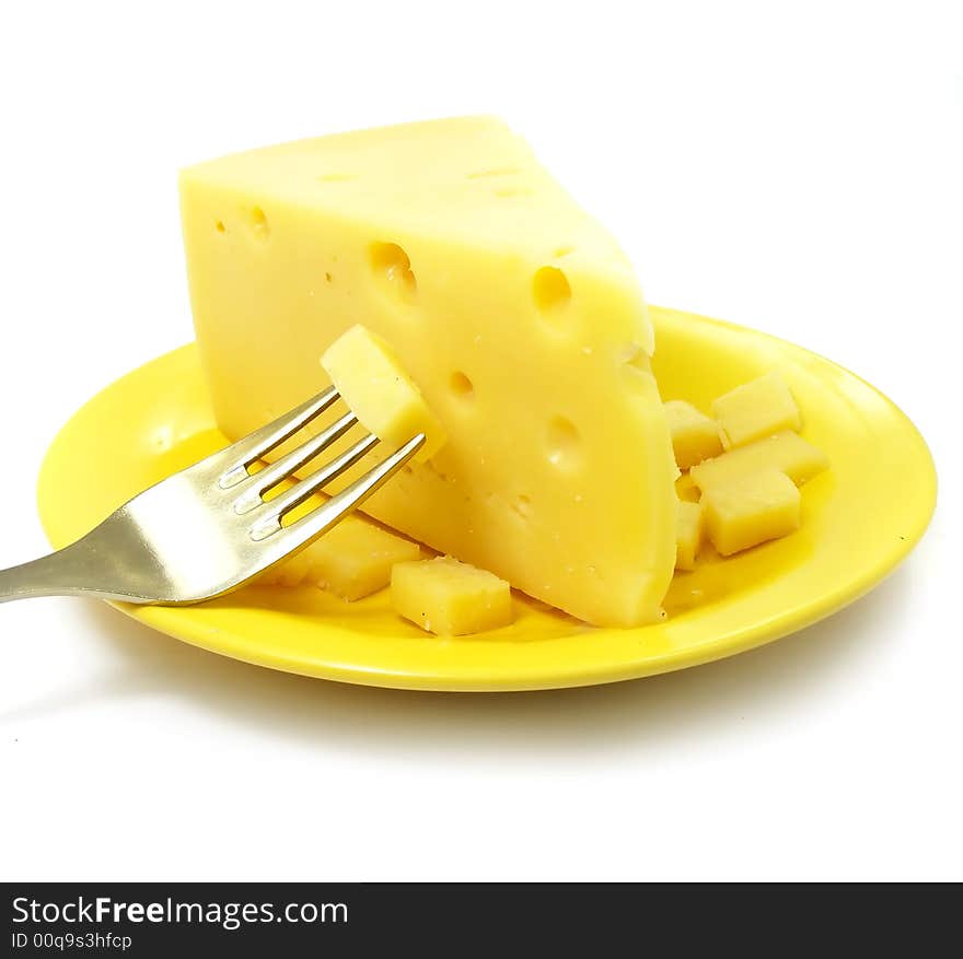 Piece of cheese on the plate