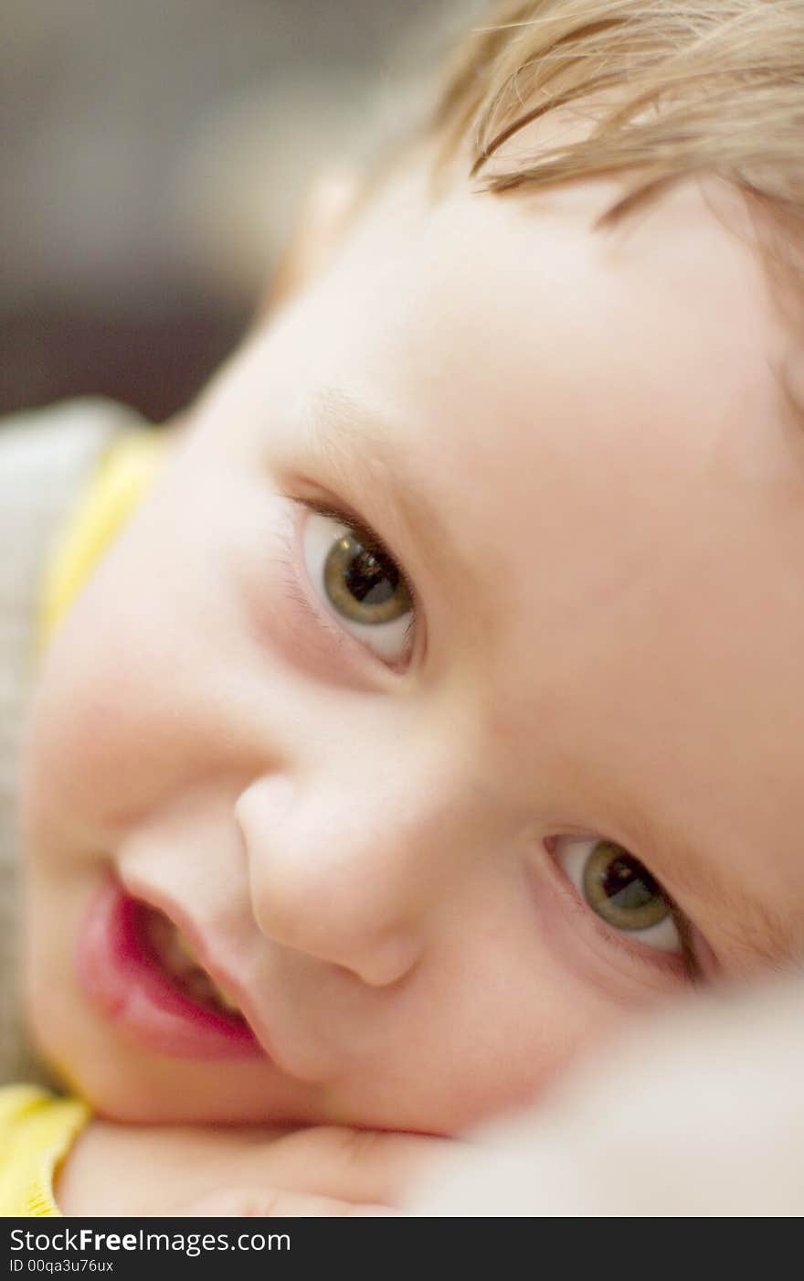 Baby boy child smiling positive over light background