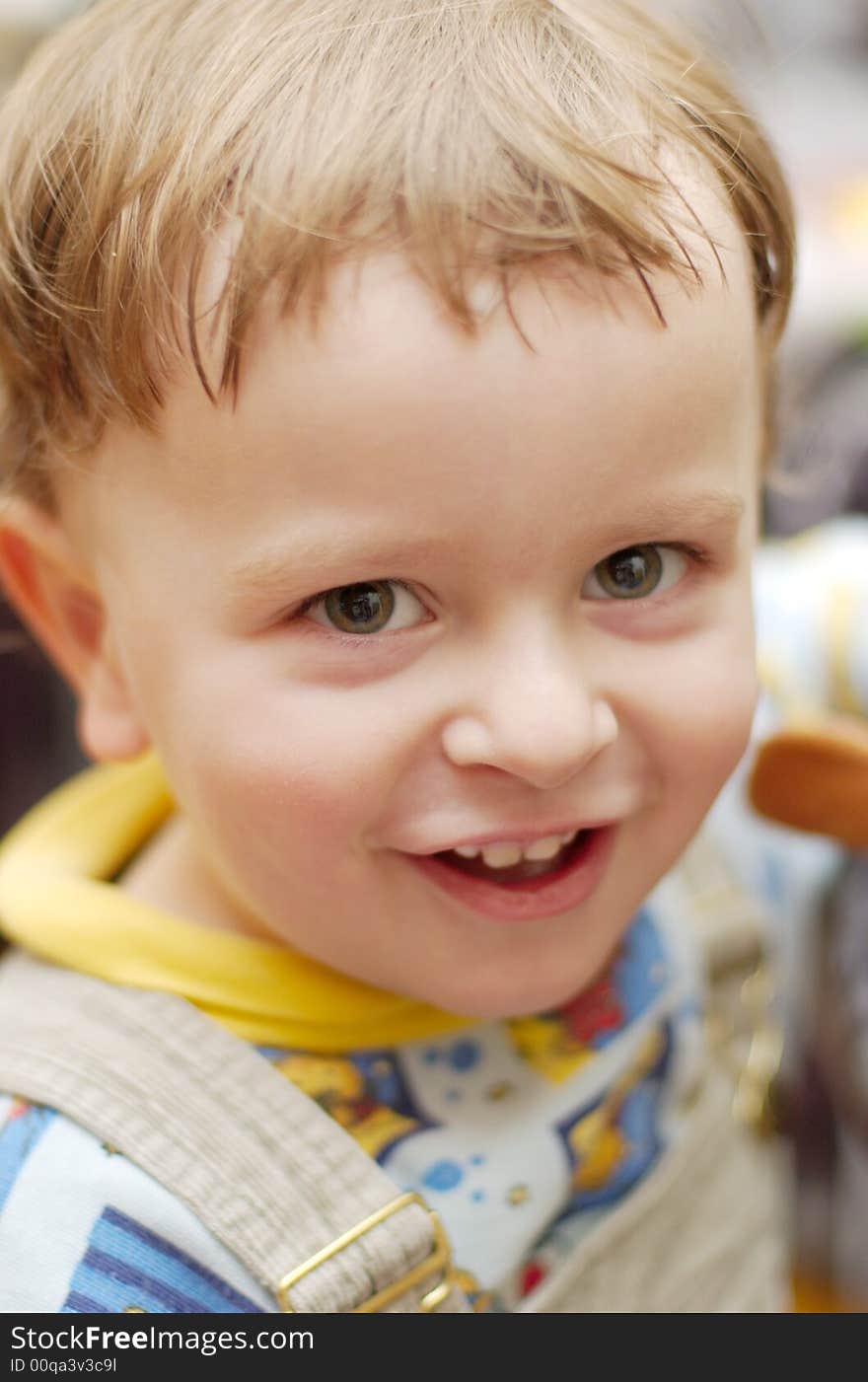 Baby boy child smiling positive over light background