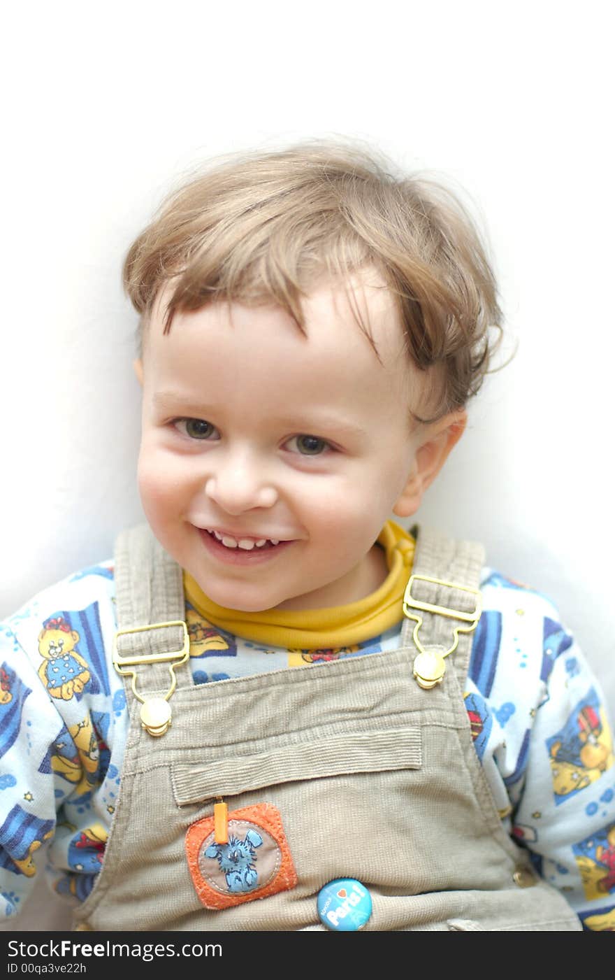 Baby boy child smiling positive over light background