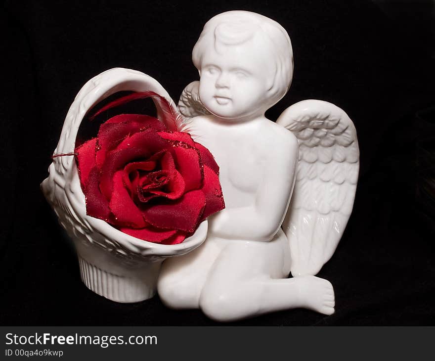 Valentine s gift with angel figure and red rose