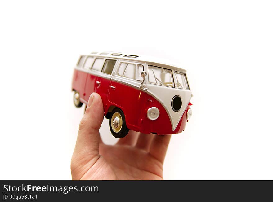 An old bus toy in hands