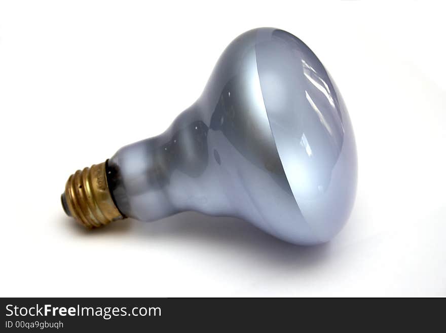 Blue colored daylight light bulb at white background