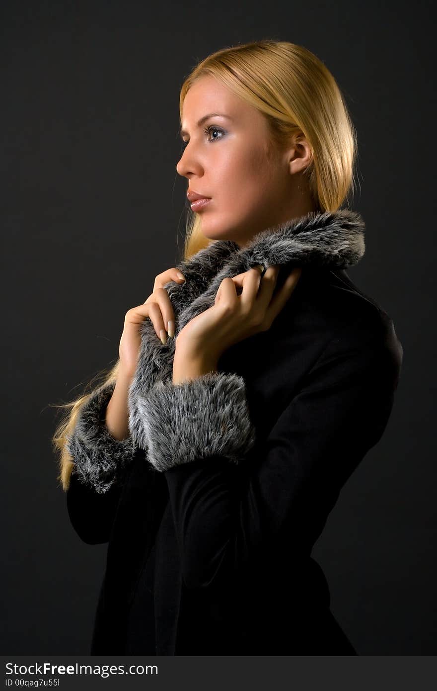 Woman in fur lined winter coat