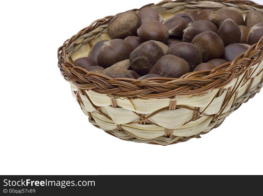 Chestnuts in the basket on white backgrounds