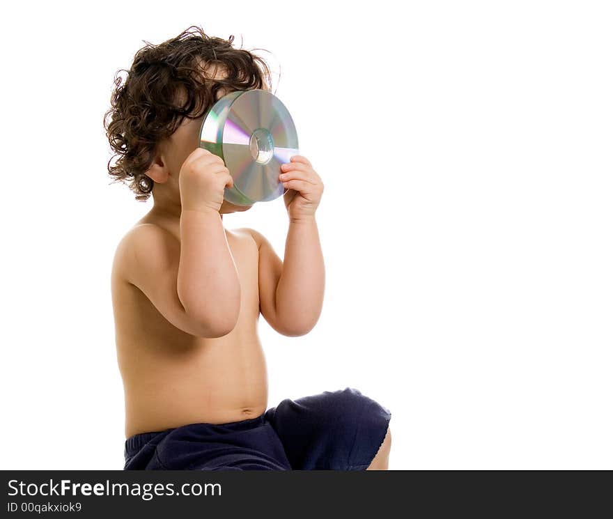 Baby playing with disk,isolated ona white background. Baby playing with disk,isolated ona white background.