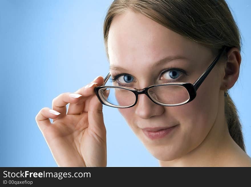 Business woman, portrait on blue