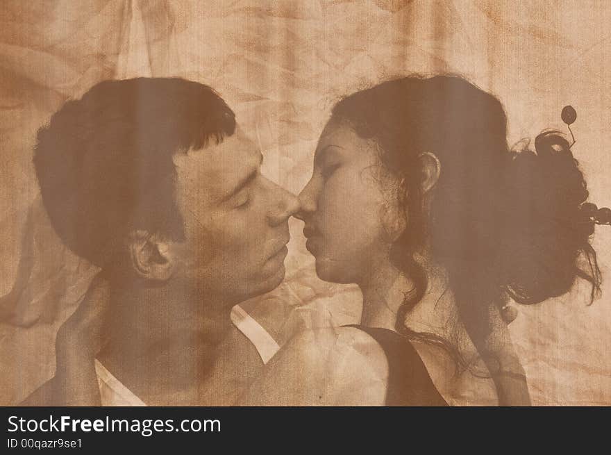 The enamoured girl and the guy embrace. Sepia. The enamoured girl and the guy embrace. Sepia