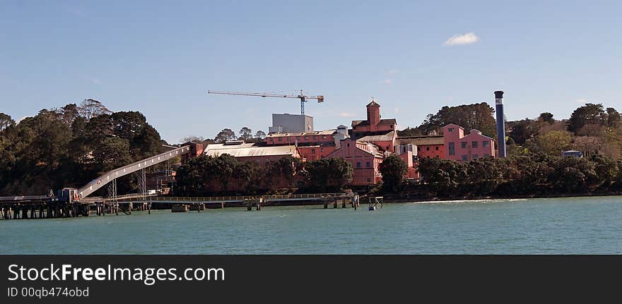 Historic Chelsea Sugar Factory in Auckland harbor, New Zealand. Historic Chelsea Sugar Factory in Auckland harbor, New Zealand