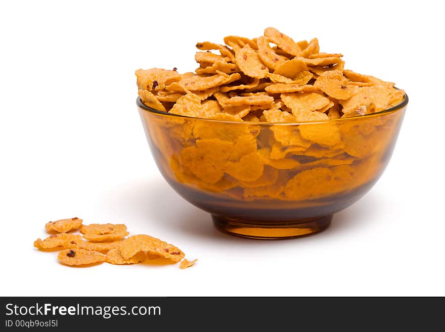 Bowl of cornflakes, isolated on white background