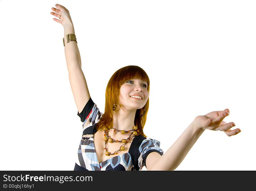 Young smiling woman dancing. Isolated on white background.