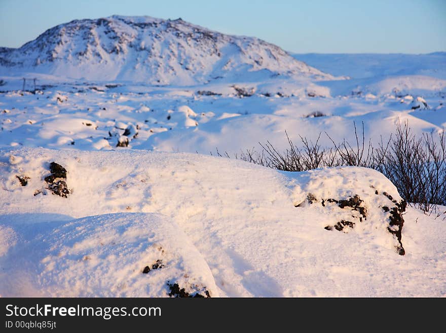 Snow covered landscape in winter, nice light and texture. Snow covered landscape in winter, nice light and texture